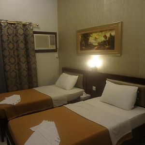 Kamer met een Queen Size Bed